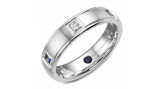 A satin finished diamond and sapphire Bleu Royale wedding band, available at Davidson & Licht.